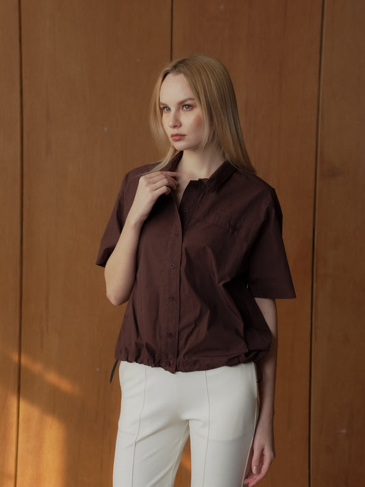 Lourdes Toggle Hem Polo Top