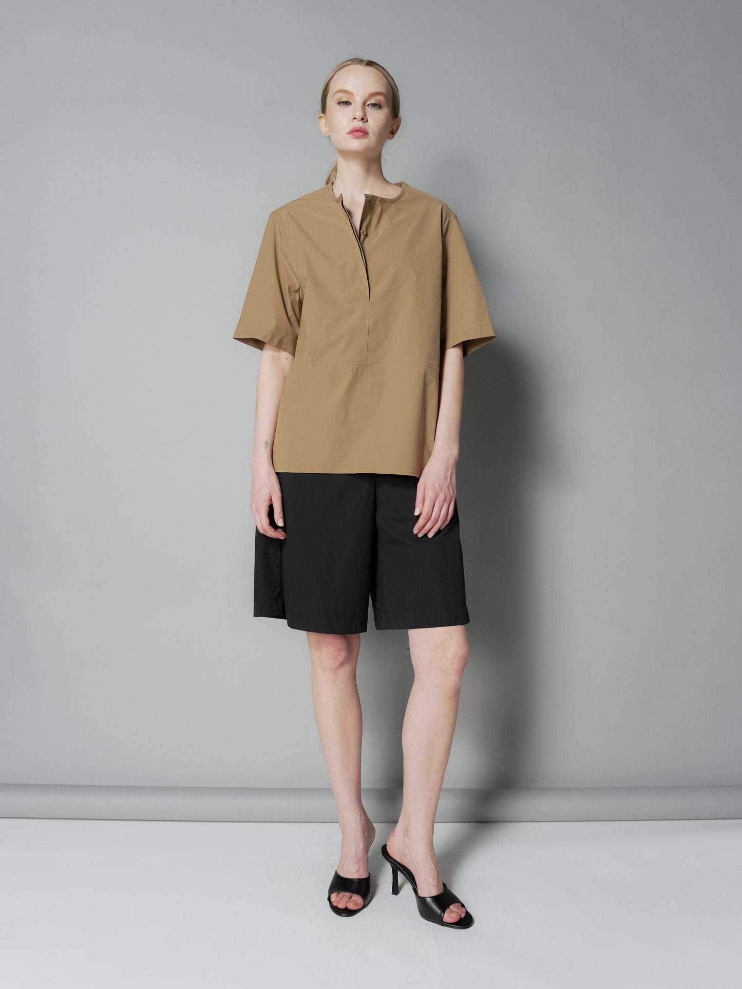 Anj Curved Hem Loose Top