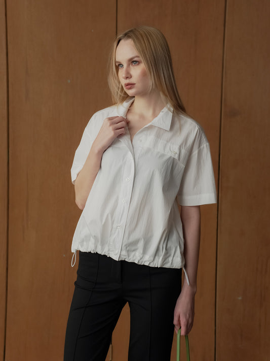 Lourdes Toggle Hem Polo Top