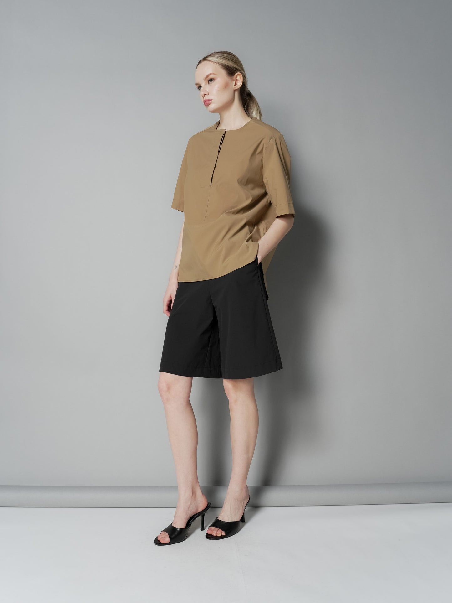 Anj Curved Hem Loose Top